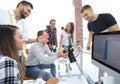 Group photo of editors working in a modern office. Royalty Free Stock Photo