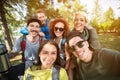 Group photo of smiling hikers in wood Royalty Free Stock Photo