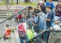 Group of Photographers and a female model doing a photo shoot. Royalty Free Stock Photo