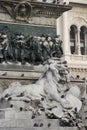 Group of Pigeons on Lion head statue at Piazza Duomo of Milano Italy, dirty from bird pooping shit on attractive sculpture art