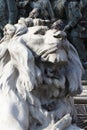 Group of Pigeons on The marvellous lion statue at Piazza Duomo of Milano Italy, dirty from bird pooping shit