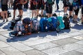 Group of Pilgrim backpack in a row on paving stone of Obradoiro square, Santiago de Compostela, Spain