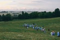 A group of pilgrims in the field