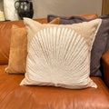 A group of pillows on a couch for sale at a Pottery Barn Retail Store in Orlando, Florida Royalty Free Stock Photo