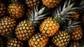 A group of pineapples with green leaves background