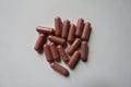 Group of pink capsules of PQQ supplement from above Royalty Free Stock Photo