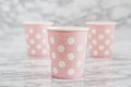 Group of Pink Disposable Paper Cups