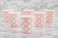 Group of Pink Disposable Paper Cups