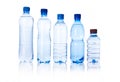 Group plastic bottles of water on white Royalty Free Stock Photo