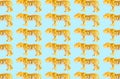 Group of plastic tiger doll on color background