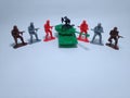 Group of plastic toy soldiers with tank