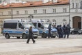 Group of policeman in the street with police cars. 5 april 2023, Warsaw, Poland.