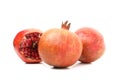 Group of pomegranate isolated on background. Juicy fruit