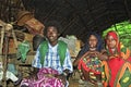 Group portrait Afar girls with mother in poor home