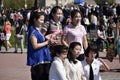 Group portrait of Chinese girls on the celebration of Victory Day in the Russian city