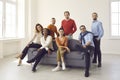 Group portrait of confident diverse business men and women in a new light office Royalty Free Stock Photo