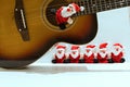 Funny santa claus toys with guitar Royalty Free Stock Photo