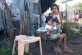 Group portrait of poor Paraguayan children in slum