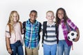 Group portrait of pre-adolescent school kids smiling on a white background