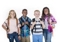 Group portrait of pre-adolescent school kids smiling on a white background