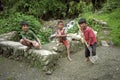 Group portrait smiling and working Filipino boys