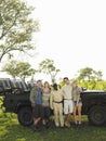 Group Portrait Of Tourists And Safari Guide