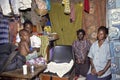Group portrait of Ugandan family in living room