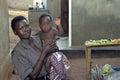 Group portrait of Ugandan mother with child