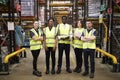 Group portrait of warehouse staff standing in the workplace Royalty Free Stock Photo