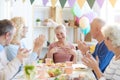 Friends clapping hands for birthday woman Royalty Free Stock Photo