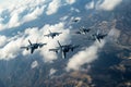 A group of powerful fighter jets flies in precise formation against a clear blue sky, A formation of fighter aircraft performing