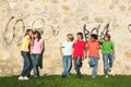 Group of pre teens whispering Royalty Free Stock Photo