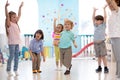 Group of children doing gymnastics in kindergarten Royalty Free Stock Photo