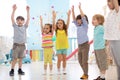 Group of children doing kids gymnastics in gym Royalty Free Stock Photo