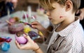 A group of primary schoolers colouring easter eggs Royalty Free Stock Photo