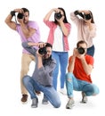 Group of professional photographers with cameras on white background Royalty Free Stock Photo