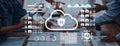 Business team collaborating on cloud computing security with data analytics and artificial intelligence symbols in a Royalty Free Stock Photo