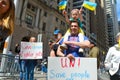 Group of protestants gathered at Bowling Green Park in New York City showing Solidarity with Ukraine