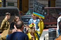 Group of protestants gathered at Bowling Green Park in New York City showing Solidarity with Ukraine