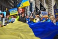 Group of protestants gathered at Bowling Green Park in New York City showing Solidarity with Ukraine