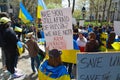 Group of protestants gathered at Bowling Green Park in New York City showing Solidarity with Ukraine