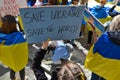 Group of protestants gathered at Bowling Green Park in New York City showing Solidarity with Ukraine