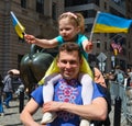 Group of protestants gathered at Bowling Green Park in New York City showing Solidarity with Ukraine