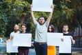 Group of protesting young people outdoors