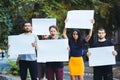 Group of protesting young people outdoors