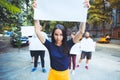 Group of protesting young people outdoors