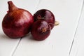 A group of purple vegetable bulbs with natural light