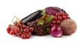 Group of purple vegetables and fruits on white