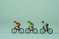 A group of racing cyclists isolated on light background