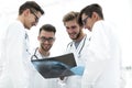 Group of radiologists discussing x-ray Royalty Free Stock Photo